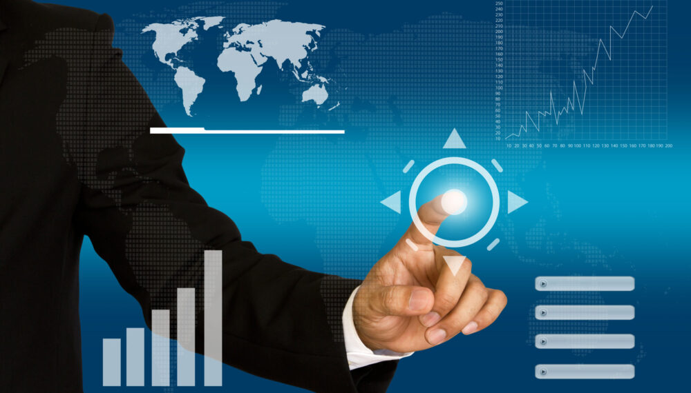 Business hand pushing a button on a touch screen interface